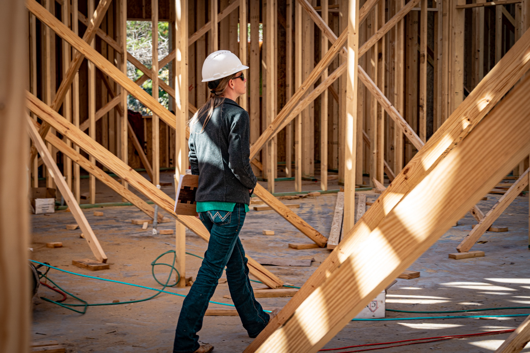 Structural Engineer walking through home build